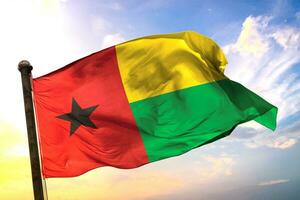 Guinea-Bissau 3D rendering flag waving isolated sky and cloud background photo