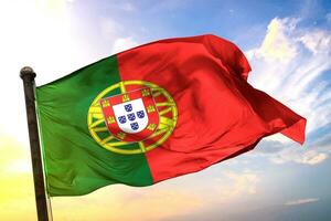 Portugal 3D rendering flag waving isolated sky and cloud background photo