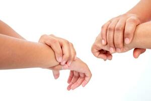 During the coronavirus epidemic mother teaches children to wash their hands with alcohol gel isolated on white background. photo