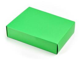 blank green paper box on white background photo