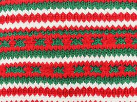 close up christmas knitted pattern background photo