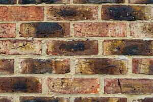 texture background of red brick wall photo