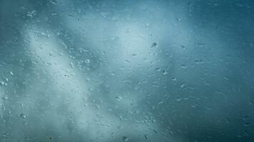 lluvia agua gotas en vaso foto