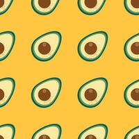 Seamless pattern with fresh green avocado on isolated yellow background. Trendy vector design for summer fashion textile prints and backgrounds. Vegetarian and healthy food.