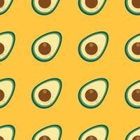 Seamless pattern with fresh green avocado on isolated yellow background. Trendy vector design for summer fashion textile prints and backgrounds. Vegetarian and healthy food.