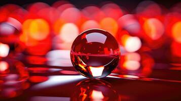 Luxurious and Elegant A Crystal Ball on a Glossy Red Glass Surface with Bokeh Background AI Generated photo