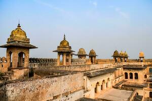 Beautiful view of Orchha Palace Fort, Raja Mahal and chaturbhuj temple from jahangir mahal, Orchha, Madhya Pradesh, Jahangir Mahal - Orchha Fort in Orchha, Madhya Pradesh, Indian archaeological sites photo