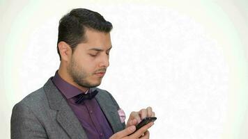 Young business man using mobile phone video