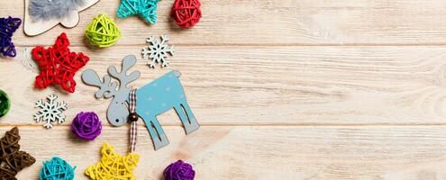 Top view Banner of Christmas decorations and toys on wooden background. Copy space. Empty place for your design. New Year concept photo