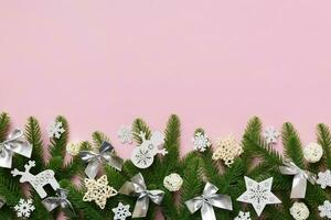 Christmas background with fir branches and Christmas decor. Top view, copy space for text photo