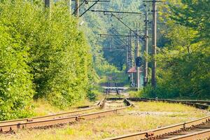 Empty railway station is waiting for a train photo