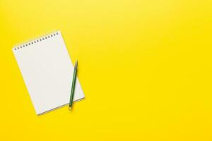 Blank notebook with pen on white background. Back to school and education concept photo