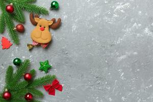 Christmas background with fir branches and Christmas decor. Top view, copy space for text photo