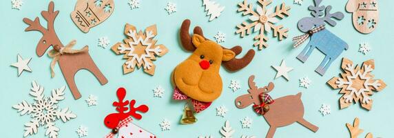 Top view of holiday decorations and toys on blue background. Christmas ornament Banner concept photo