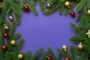 Christmas background with fir branches and Christmas decor. Top view, copy space for text photo