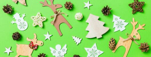 Banner Christmas green background with holiday toys and decorations. Happy New Year concept photo