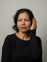 Mexican woman appears to be in pain from headache AI Generative photo