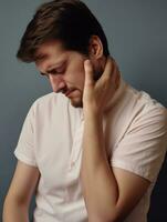 Man with pain on neutral background AI Generative photo