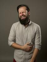 Man with pain on neutral background AI Generative photo