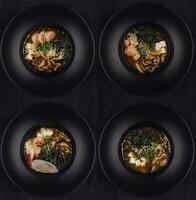 plates with different types of Thai soup photo