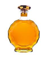 Bottle of cognac isolated on white photo