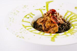 Plate with tasty soba noodles and meat photo