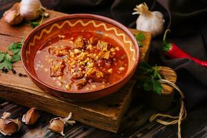 Mexican hot chili con carne in a bowl photo