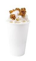 Milkshake with caramel syrup and popcorn photo