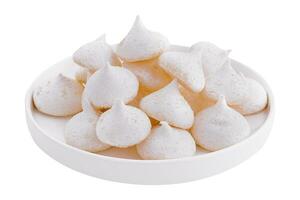 Bowl of meringue cookies isolated on white photo