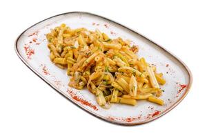 Delicious pasta with parsley and onions photo