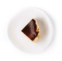 San sebastian cheesecake on plate isolated photo