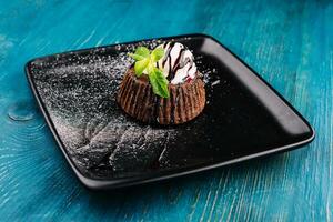 Chocolate brownie with vanilla ice cream photo