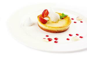 tart with fresh strawberries and vanilla cream photo