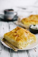 Cottage cheese casserole on white plate photo