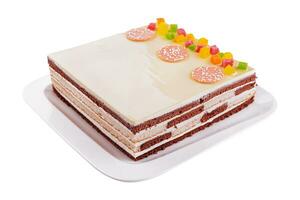 Delicious multilayer cocoa sponge cake with sugar mass photo