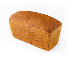 Black bread in the form of a brick on white background photo