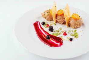 chocolate ice cream balls and crispy bread with strawberry jam photo