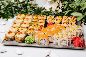 Warm Sushi Roll with Salmon, tuna and Cream Cheese photo