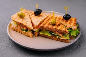 Avocado toast with smoked salmon and cucumbers photo