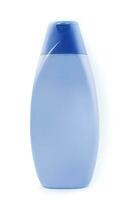 Blue shampoo bottle isolated on white photo