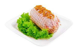 Raw pork meat rolled with spices photo