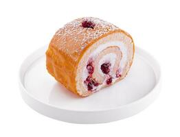 roll cake with cherries and orange glaze photo