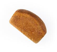 Black bread in the form of a brick on white background photo