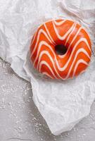 Watercolor orange donut. top view. photo