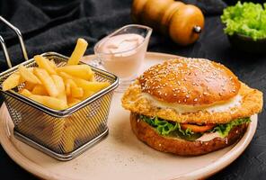 Fried chicken burger - unhealthy food style photo