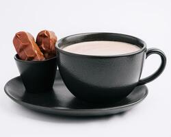 Cup of hot chocolate with chocolate photo