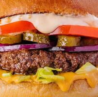 Fresh tasty burger background or texture photo