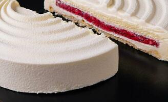 Elegant French mousse cake covered with white chocolate velour photo