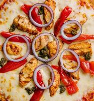 Fresh barbecue chicken pizza with vegetables photo