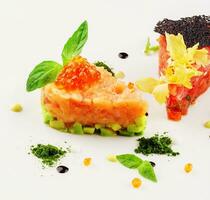 salmon and beef tartare on white plate photo